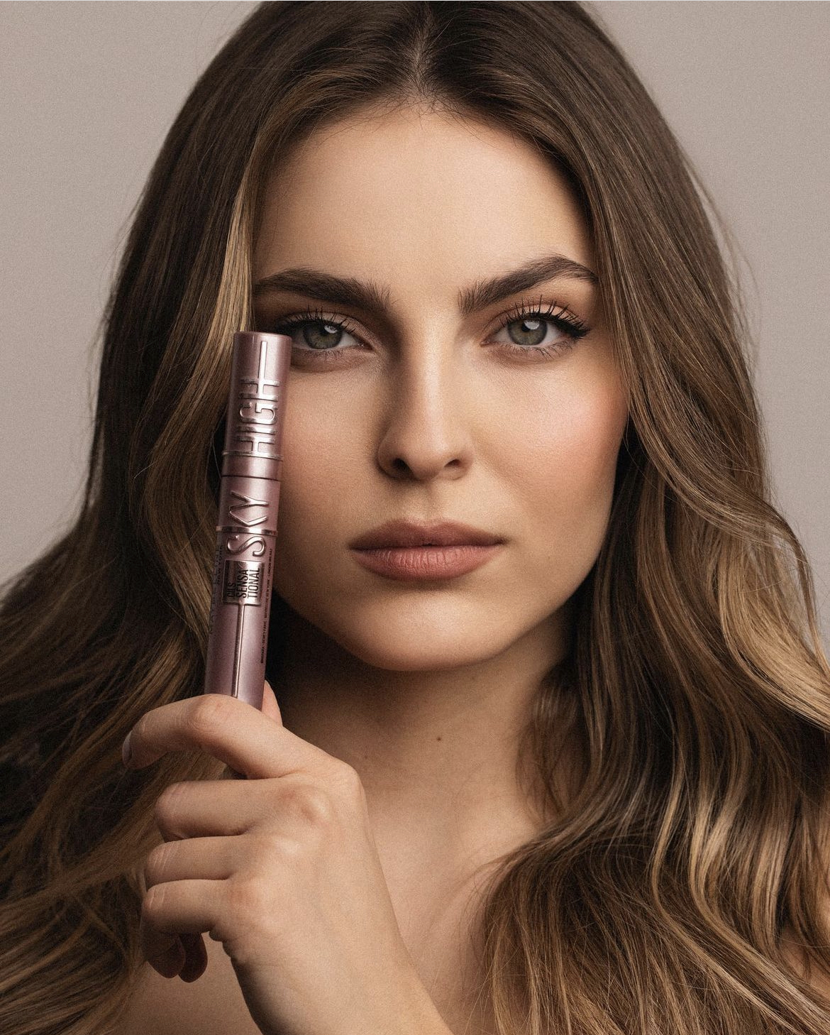 Džejla Ramović holding a WATERPROOF MASCARA